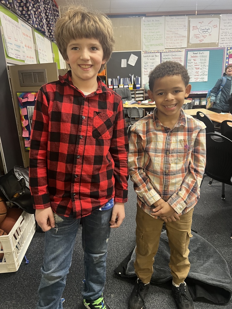 Students dress up as twins for Read Across America.