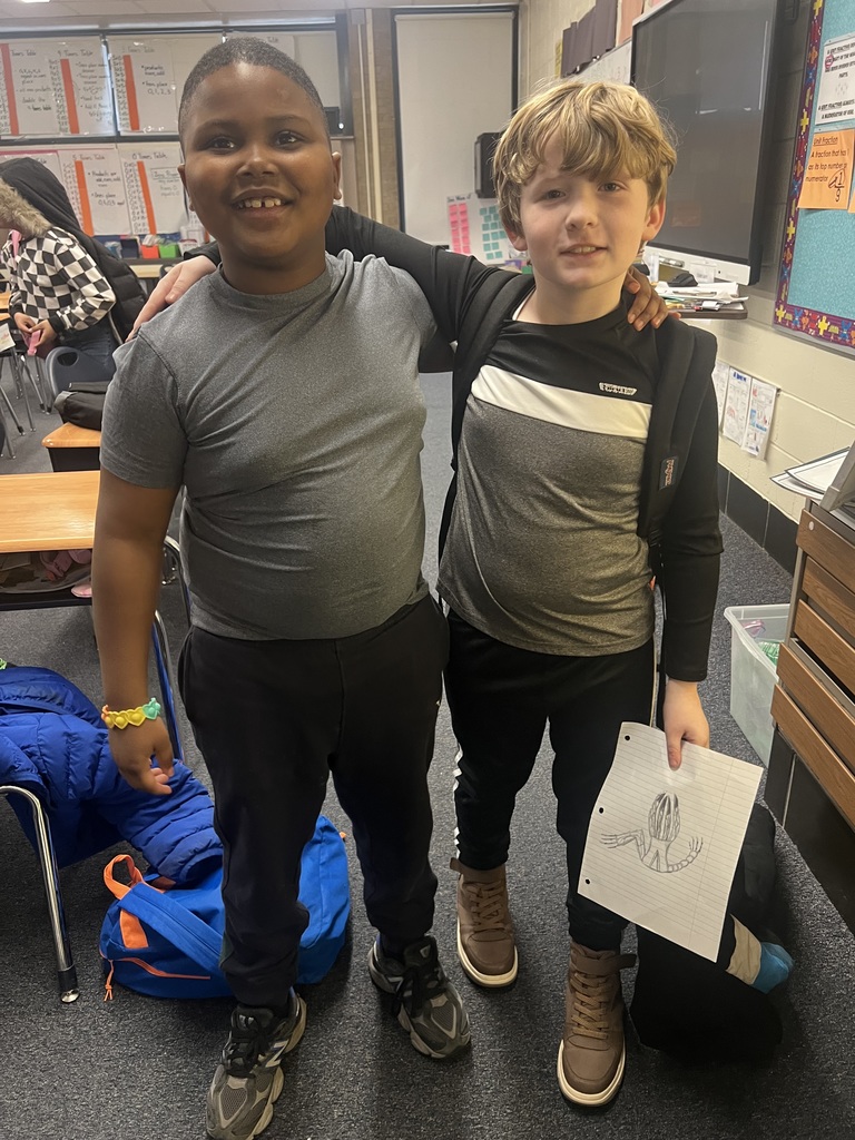 Students dress up as twins for Read Across America.