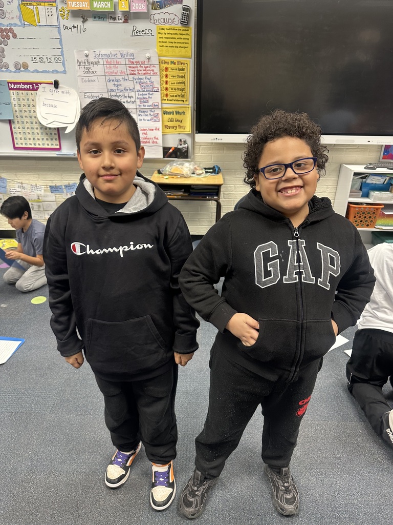 Students dress up as twins for Read Across America.