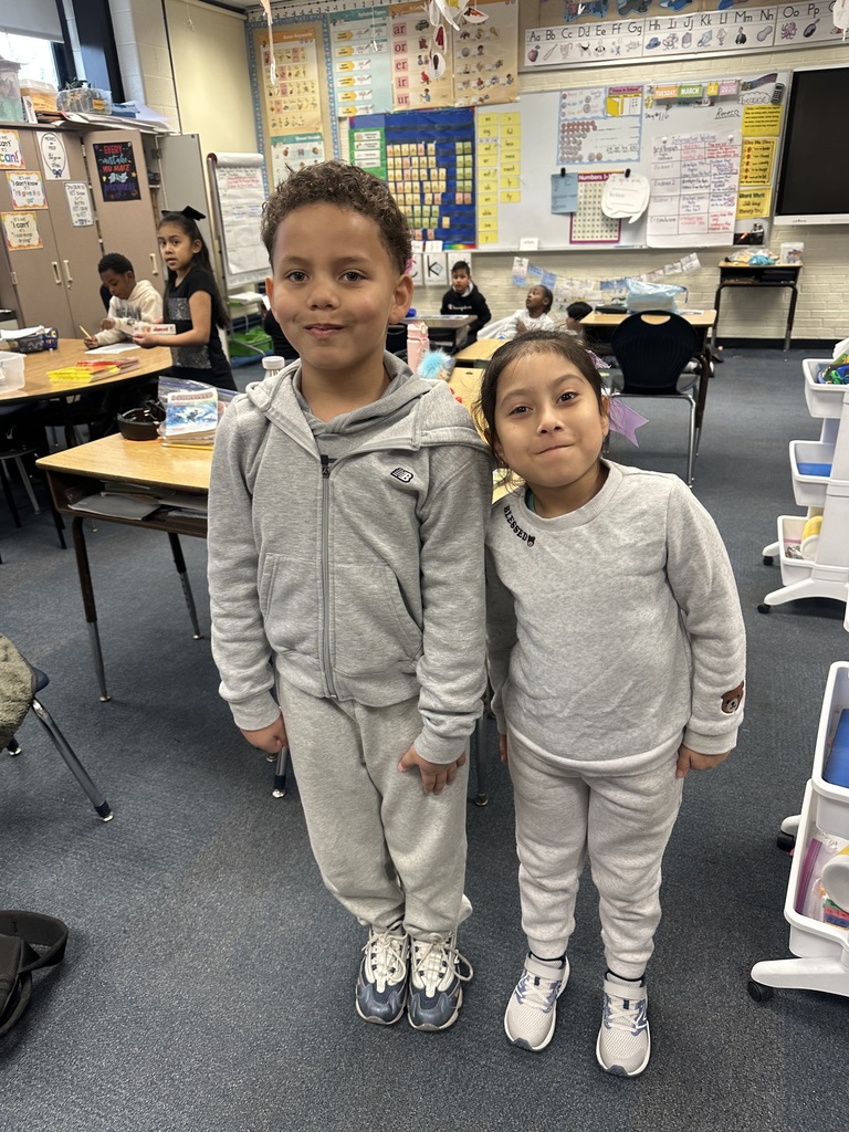 Students dress up as twins for Read Across America.