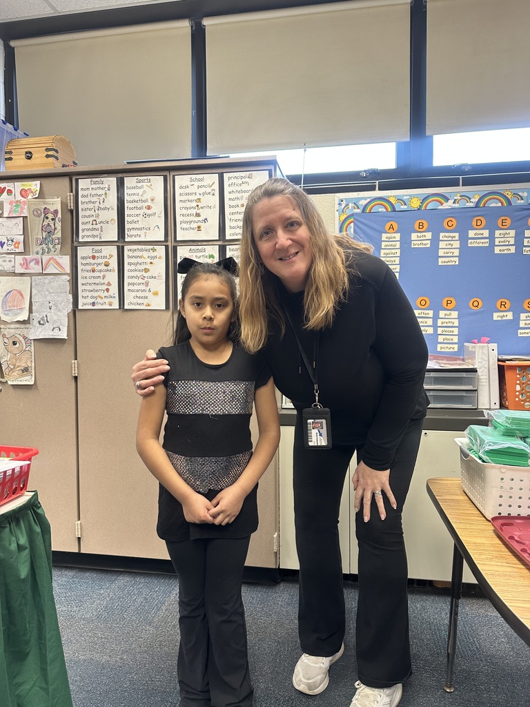 A student dresses as a teacher for twin day.