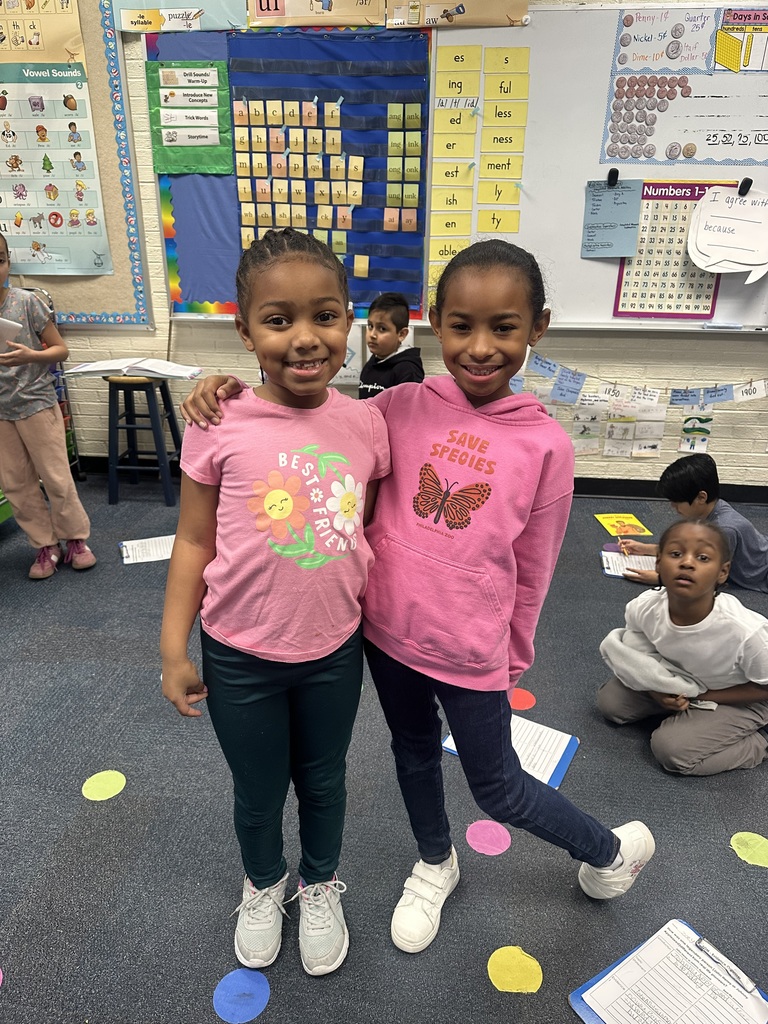Students dress up as twins for Read Across America.