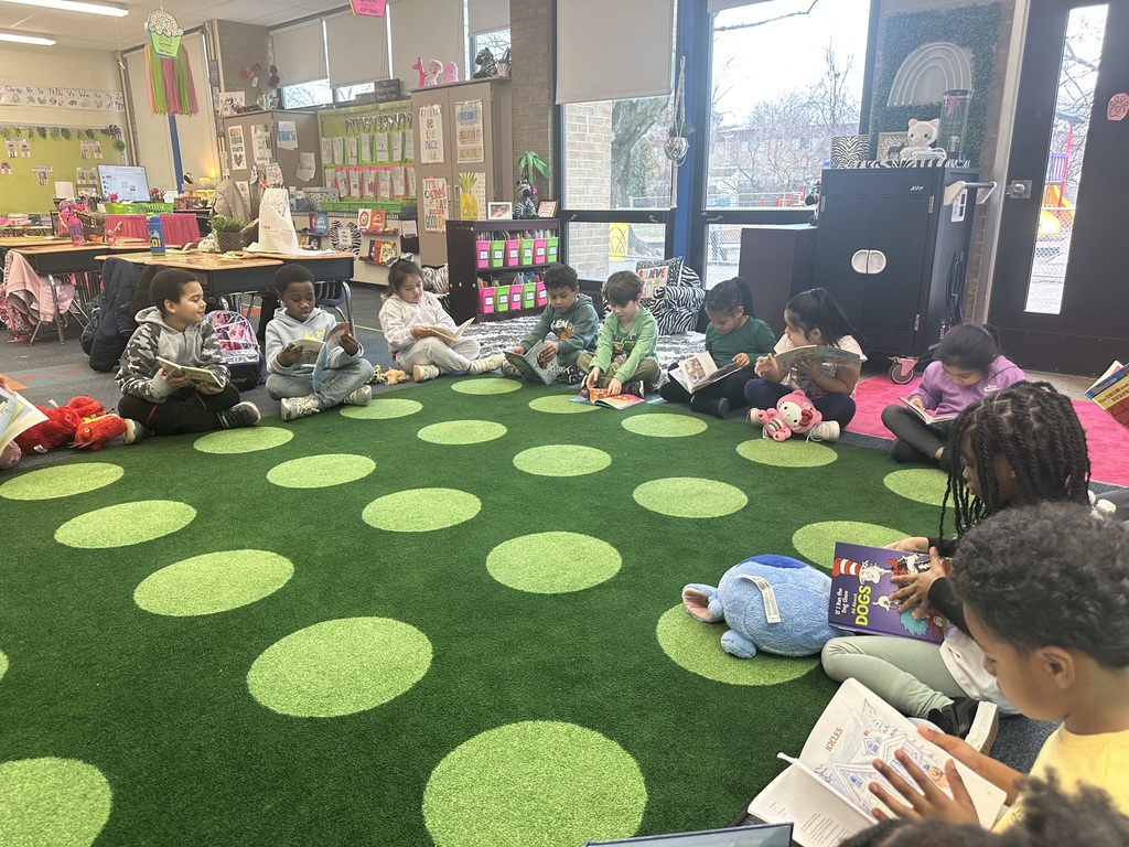 Students reading books for Read Across America.
