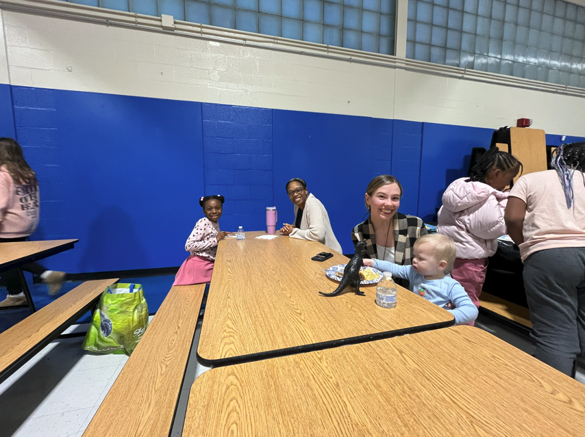 Cole Manor staff and their children at the Black History Month Celebration