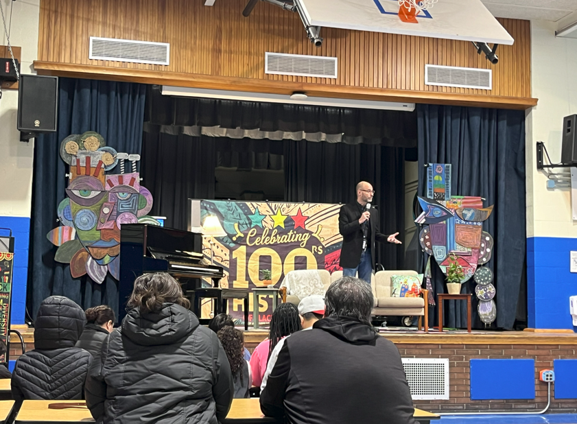 Dr. Speicher speaking at the Black History Month Celebration