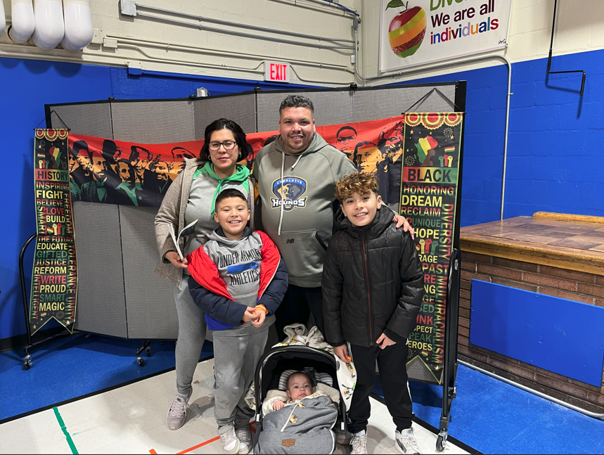 A family at the Black History Month Celebration