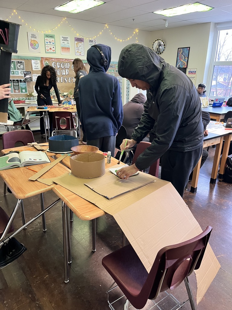 Students working together on a project in a biology class