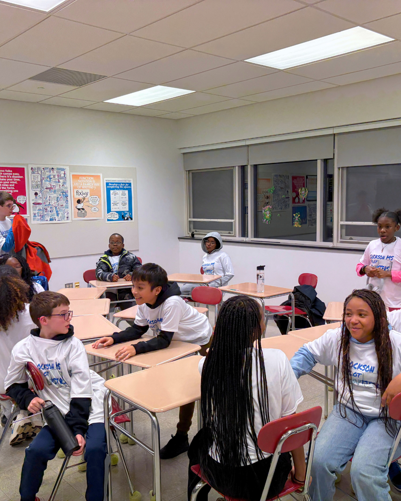 Students sitting at desks. 