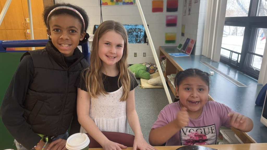 Group of studnets pose for photo.