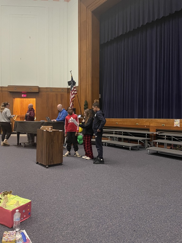 A group of students presenting at “Dream It, Design It” competition 