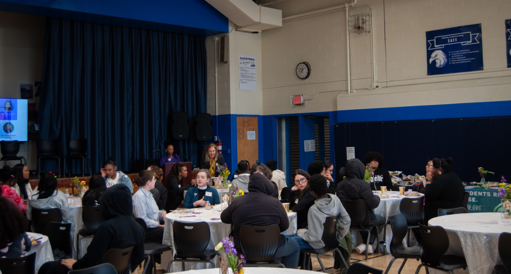 Guests and students are eating together