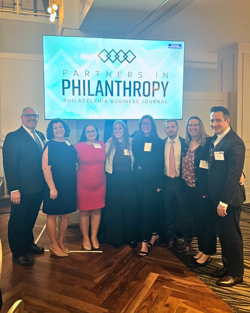 NASD and Ostroff Godshall teams pose for photo.