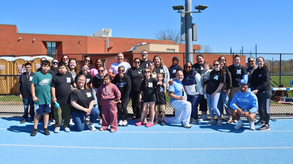 NASD Staff and students pose for large group photo at exceptional abilities day.