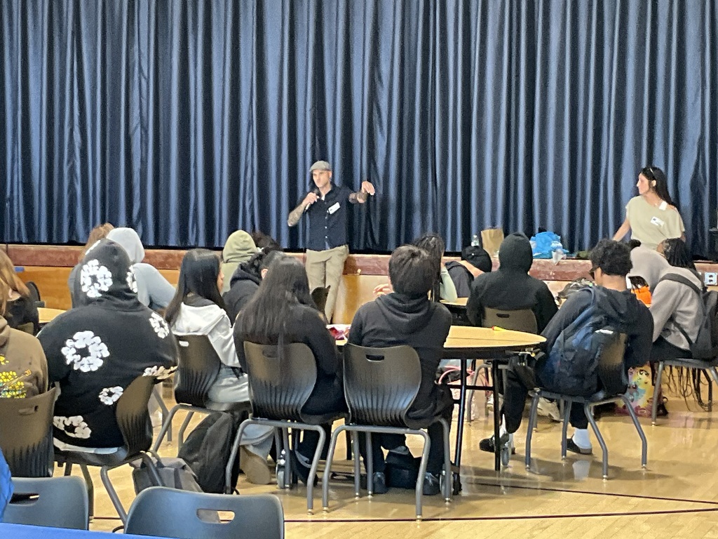 Students are listening to a speaker