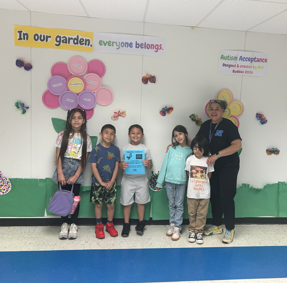 The principal and second grade students after a special lunch