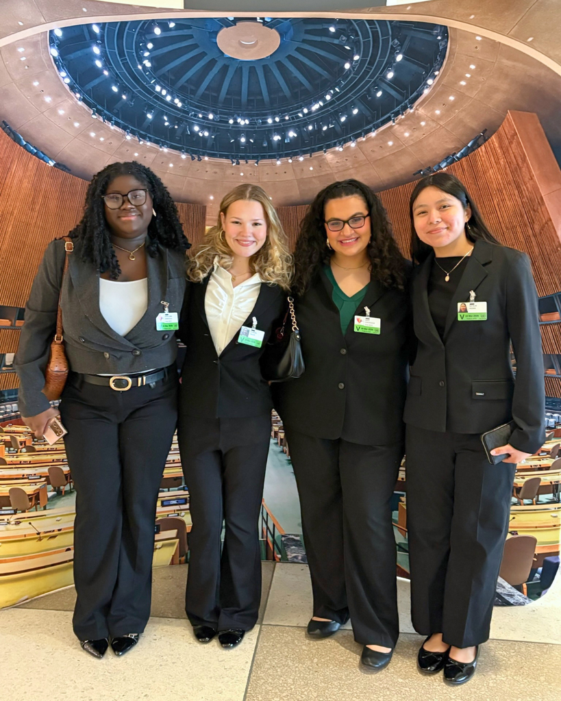 Four NAHS studnets pose for photo.