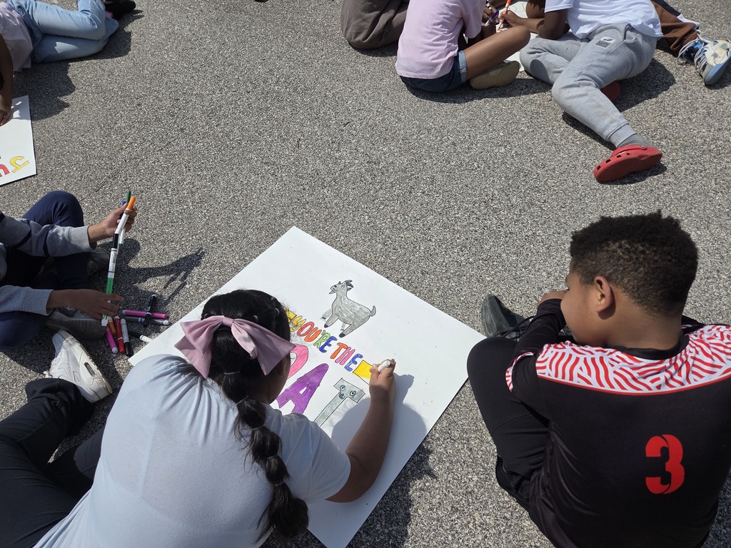 Third grade students creating field day poster together!