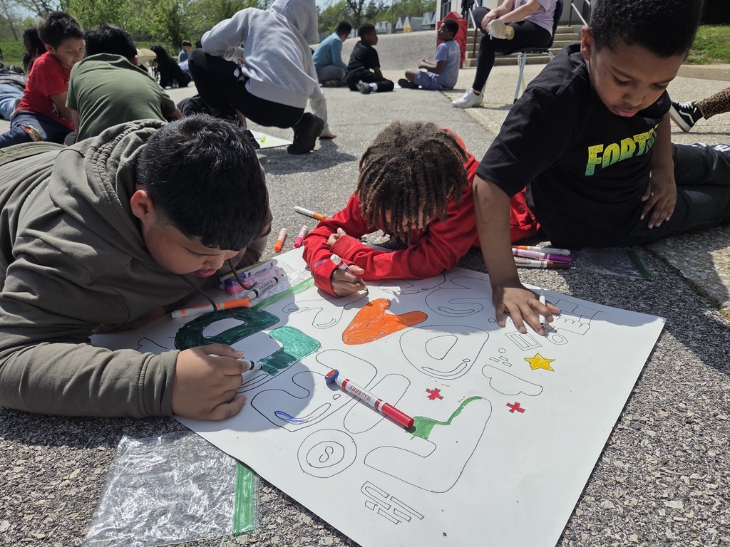 Third grade students creating field day poster together!