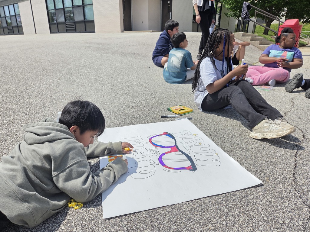 Third grade students creating field day poster together!