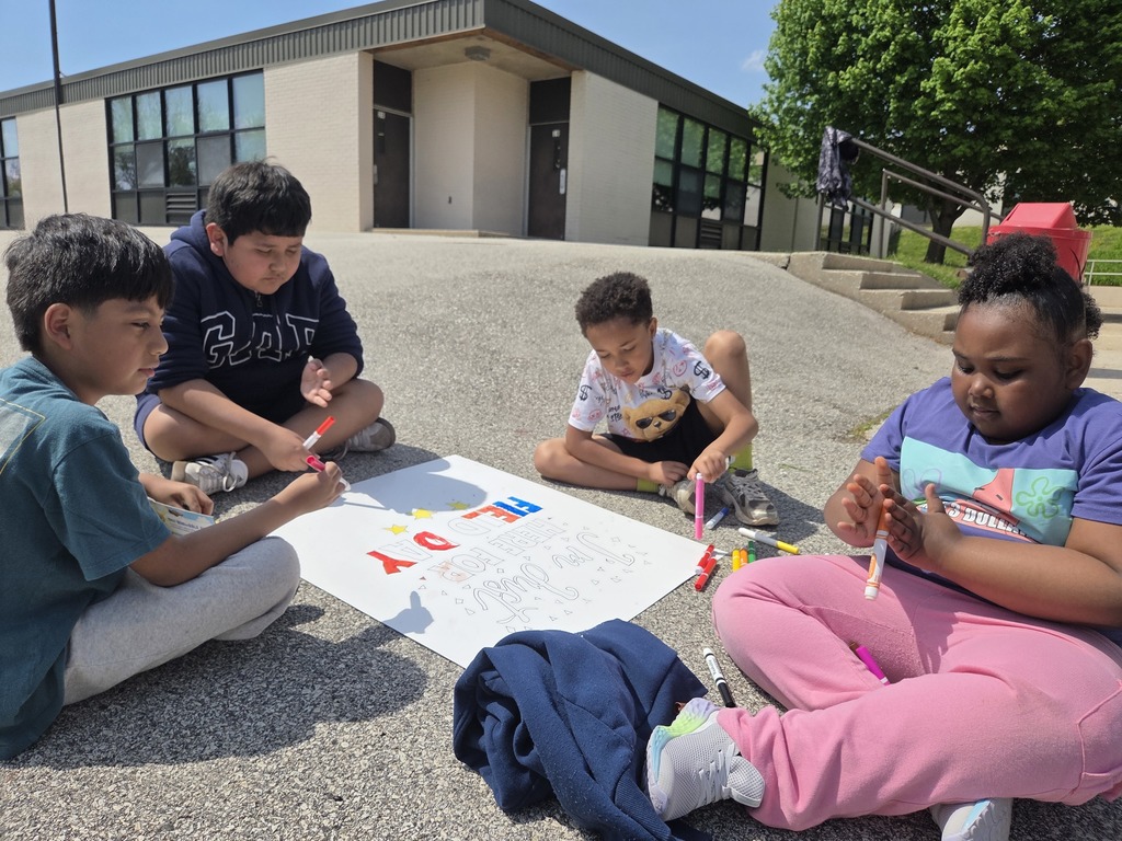 Third grade students creating field day poster together!