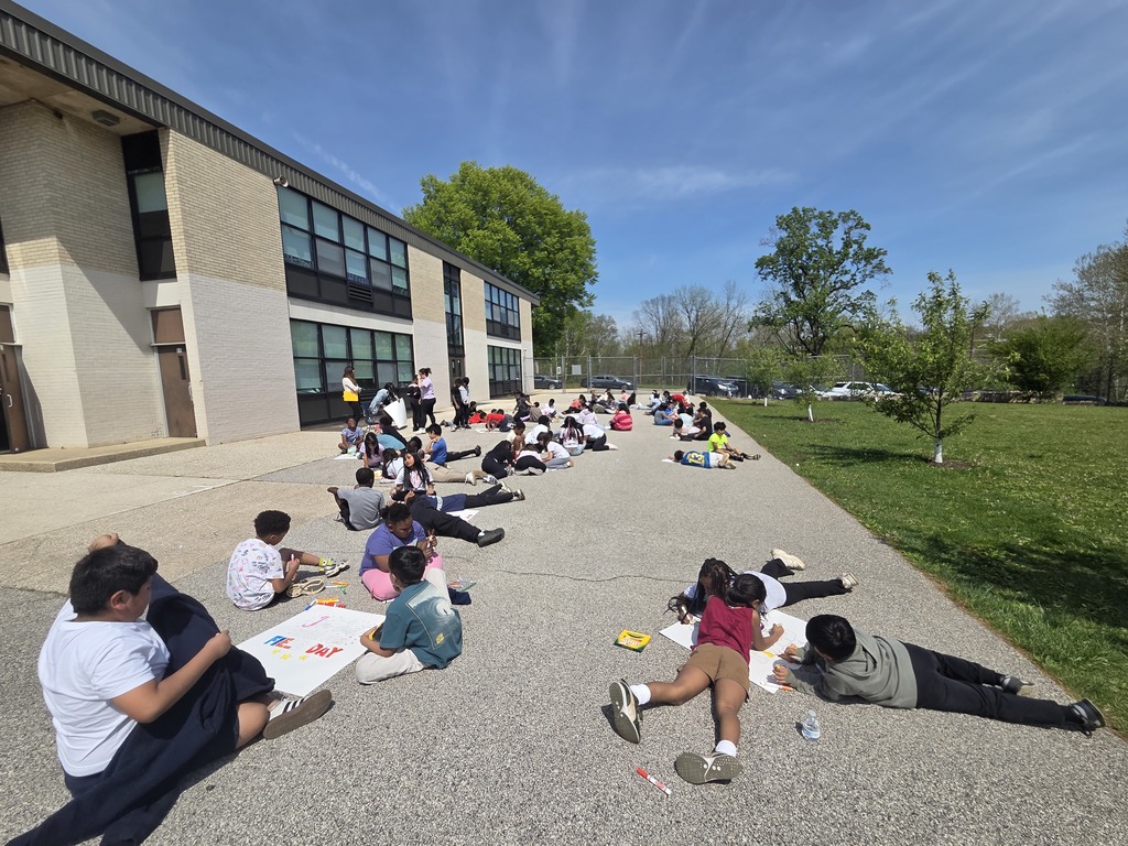 Third grade students creating field day poster together!