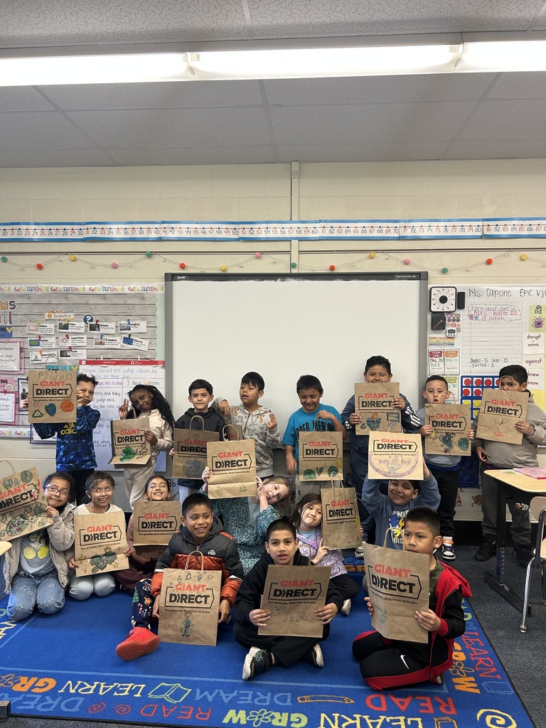 Second graders decorated grocery bags for Earth Day.
