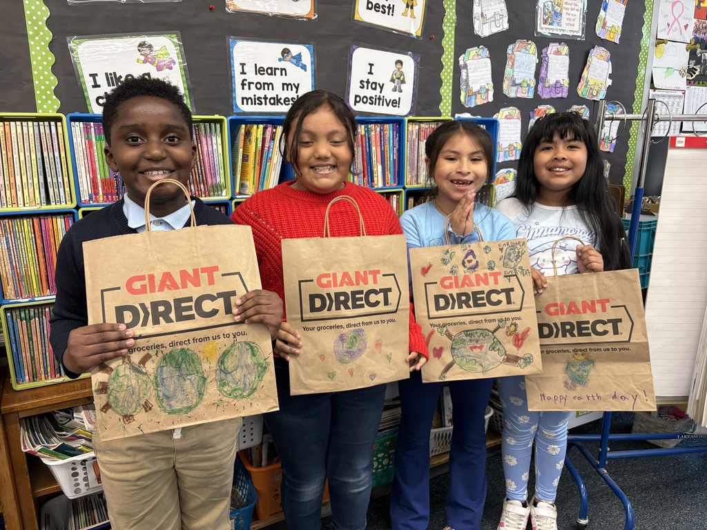 Second graders decorated grocery bags for Earth Day.