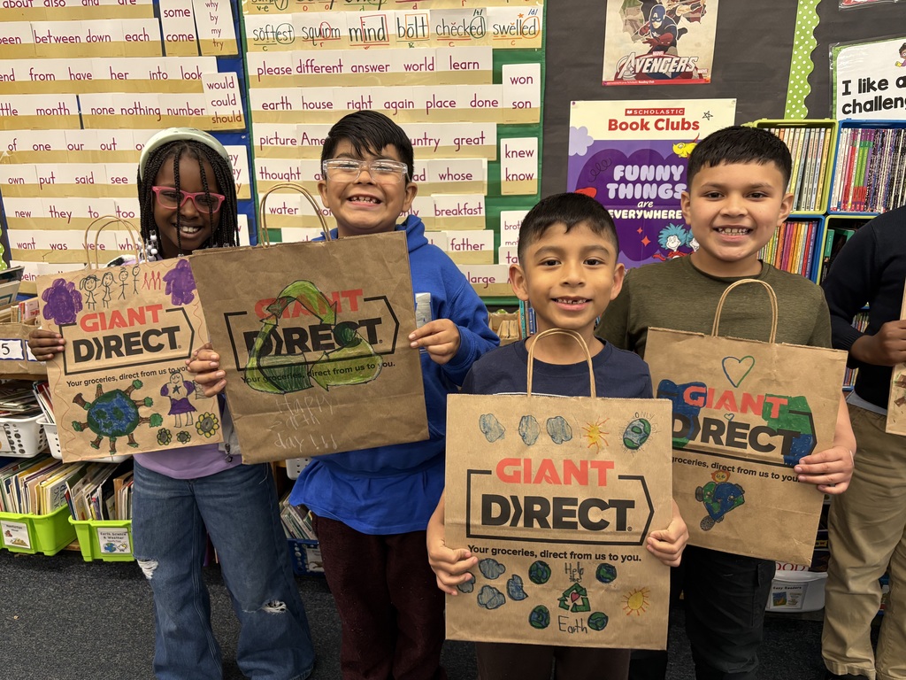 Second graders decorated grocery bags for Earth Day.