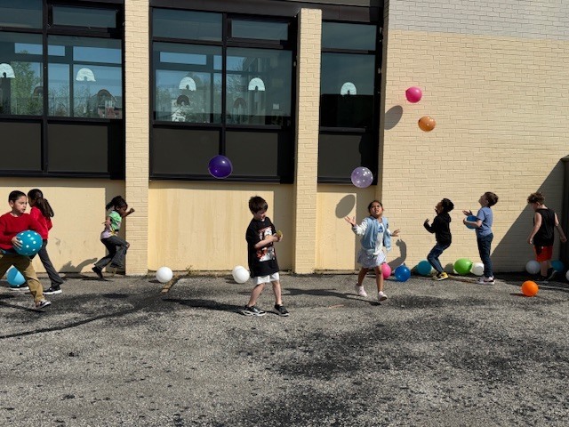 Students dancing outside.
