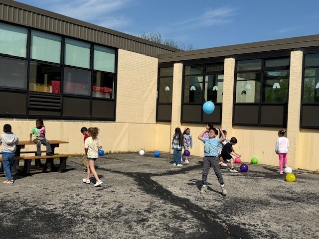 Students dancing outside.