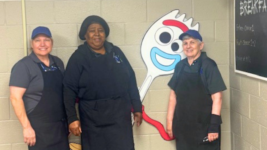 Paul Fly kitchen staff pose for group photo. 