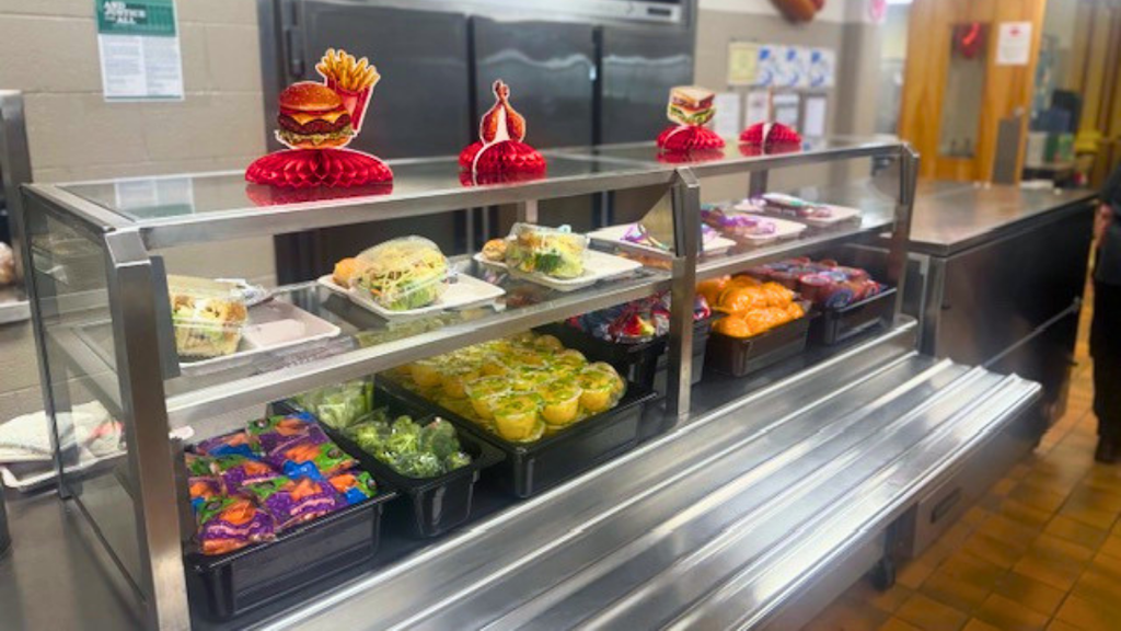 Fruit and vegetables set up in the lunch line, ready for studnets. 