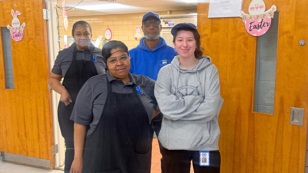 Marshall Street kitchen staff pose for group photo. 