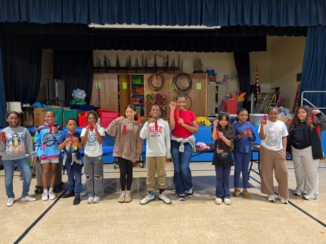 The Reading Olympics Team for Hancock Elementary holding up their ribbons!