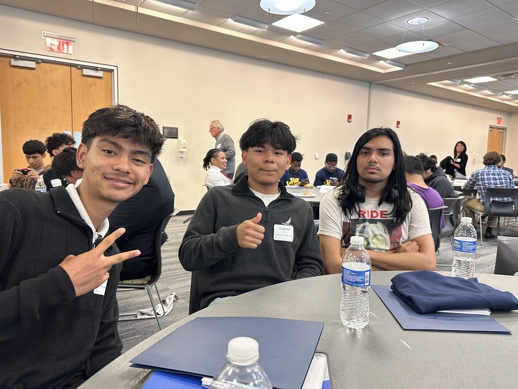3 boys are having lunch together