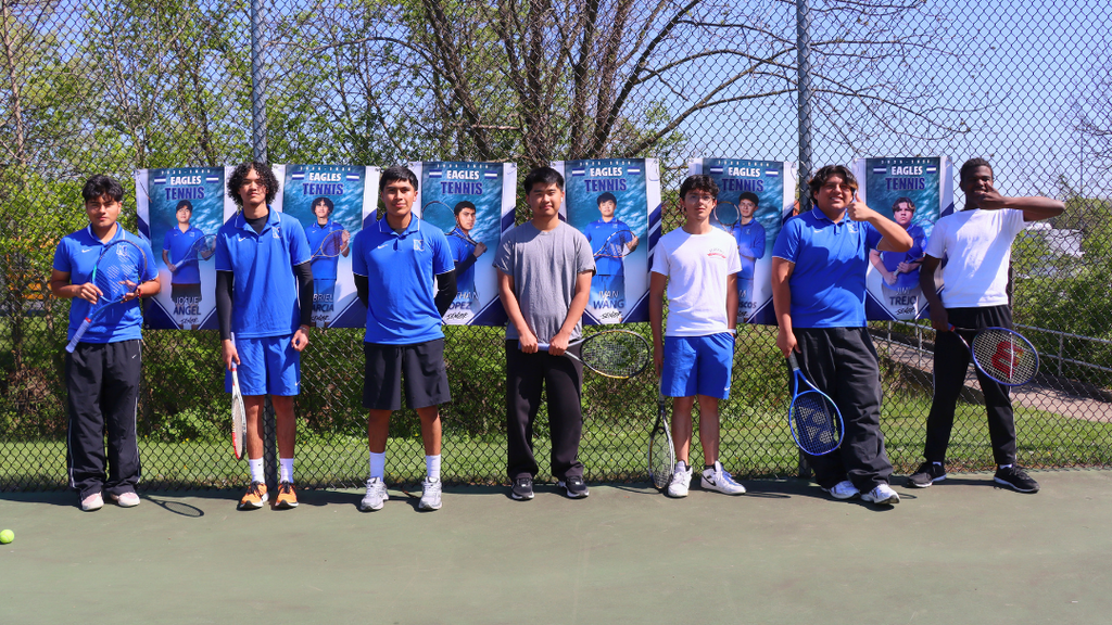 Seniors from the boys tennis team pose for group photo.