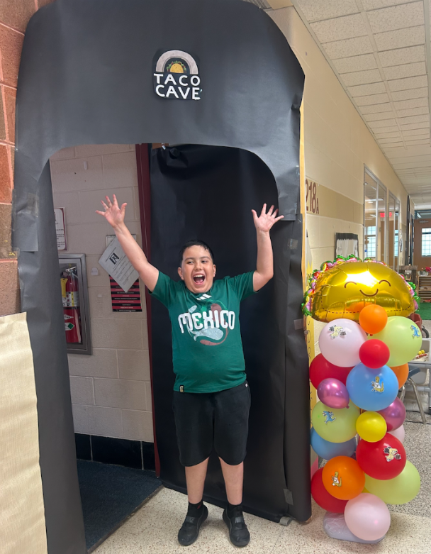 A student coming out of the "Taco Cave".