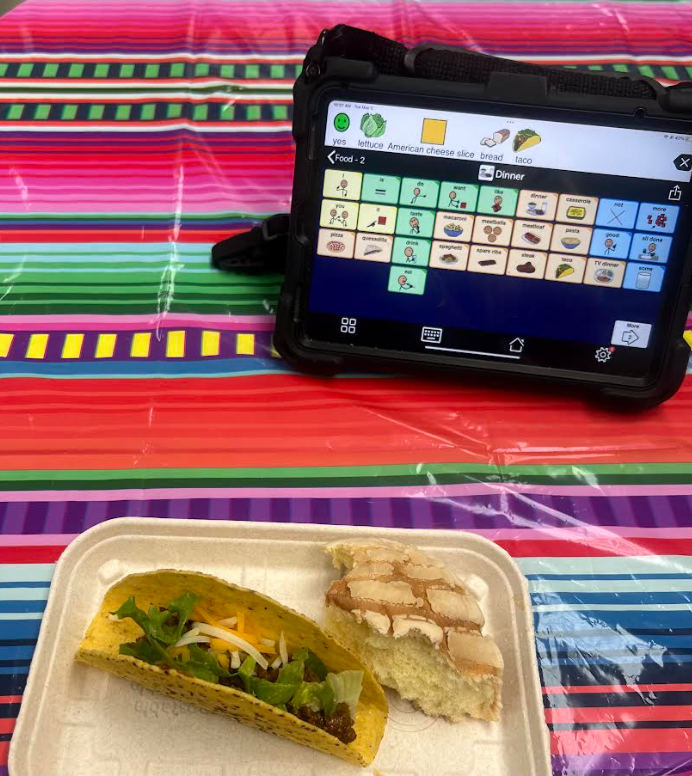Cinco de Mayo food and a Augmentative and Alternative Communication device. 