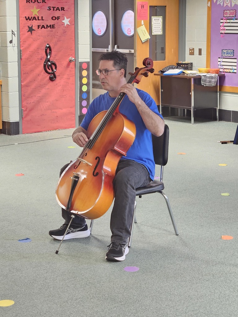 Mr. Patti demonstrating the cello.