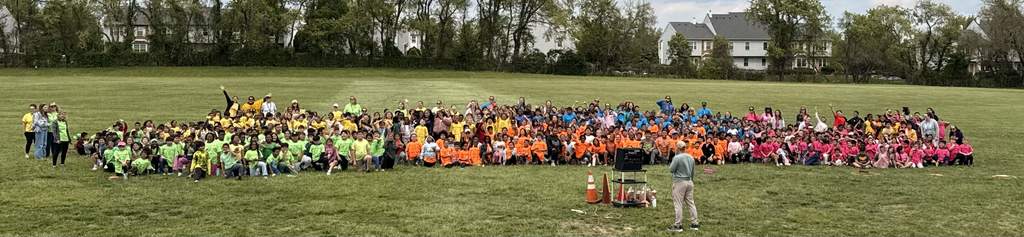 Marshall Street students and teachers pose for a group photo at the end of the Walk-a-Thon.