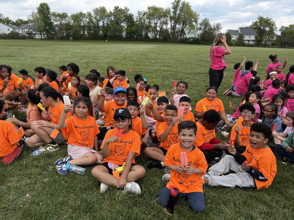Students enjoy a popsicle after the Walk-a-Thon.