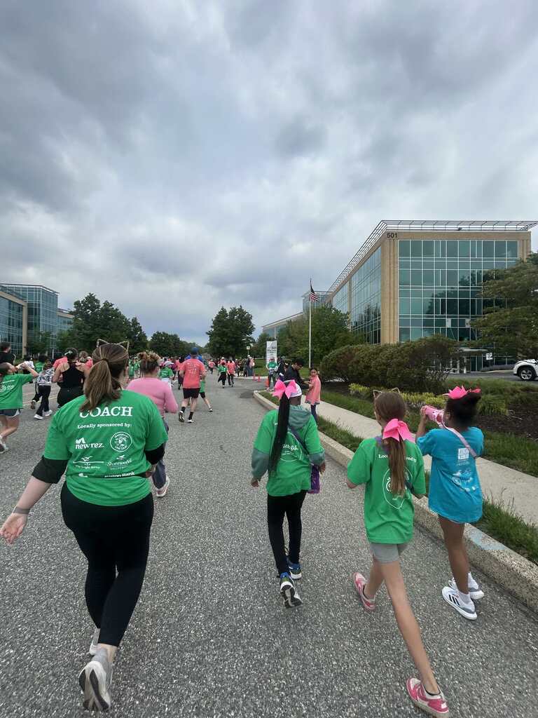 Students participate in a 5K run as part of the Girls on the Run program.