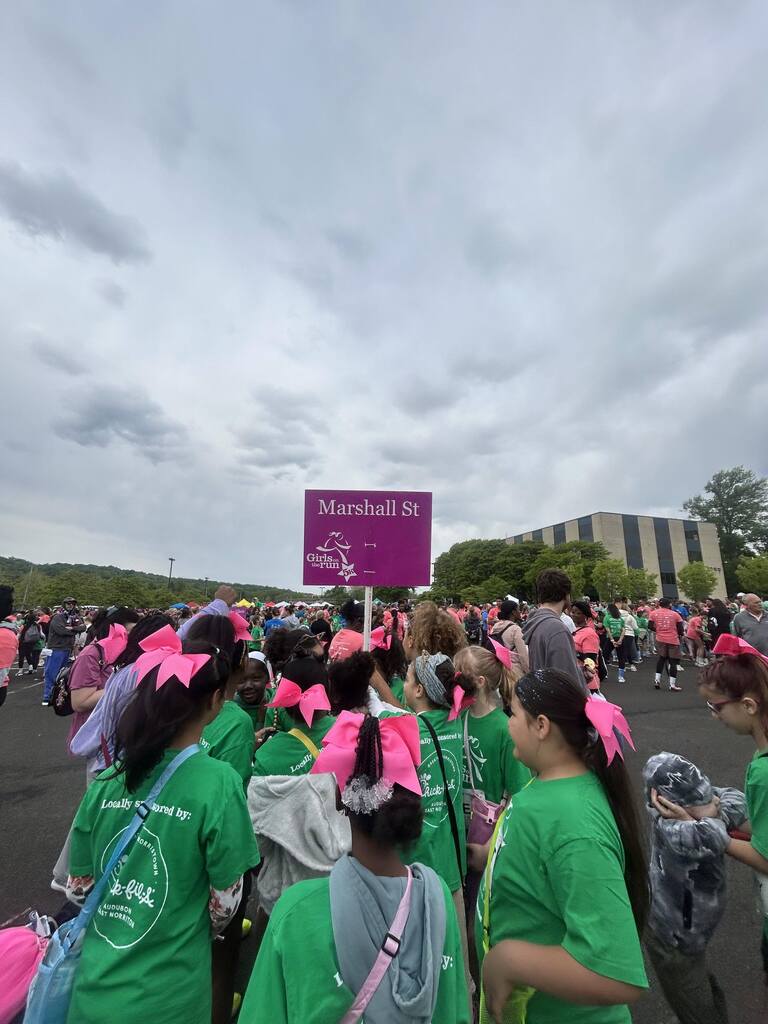 Students participate in a 5K run as part of the Girls on the Run program.