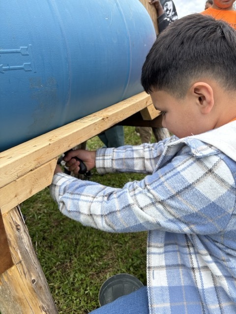 Students learned how to milk a cow.