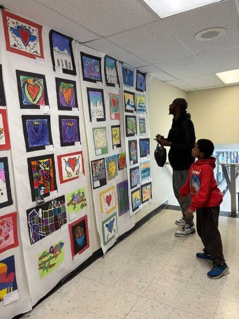 A family looking for artwork