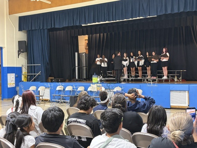 The choir singing to families