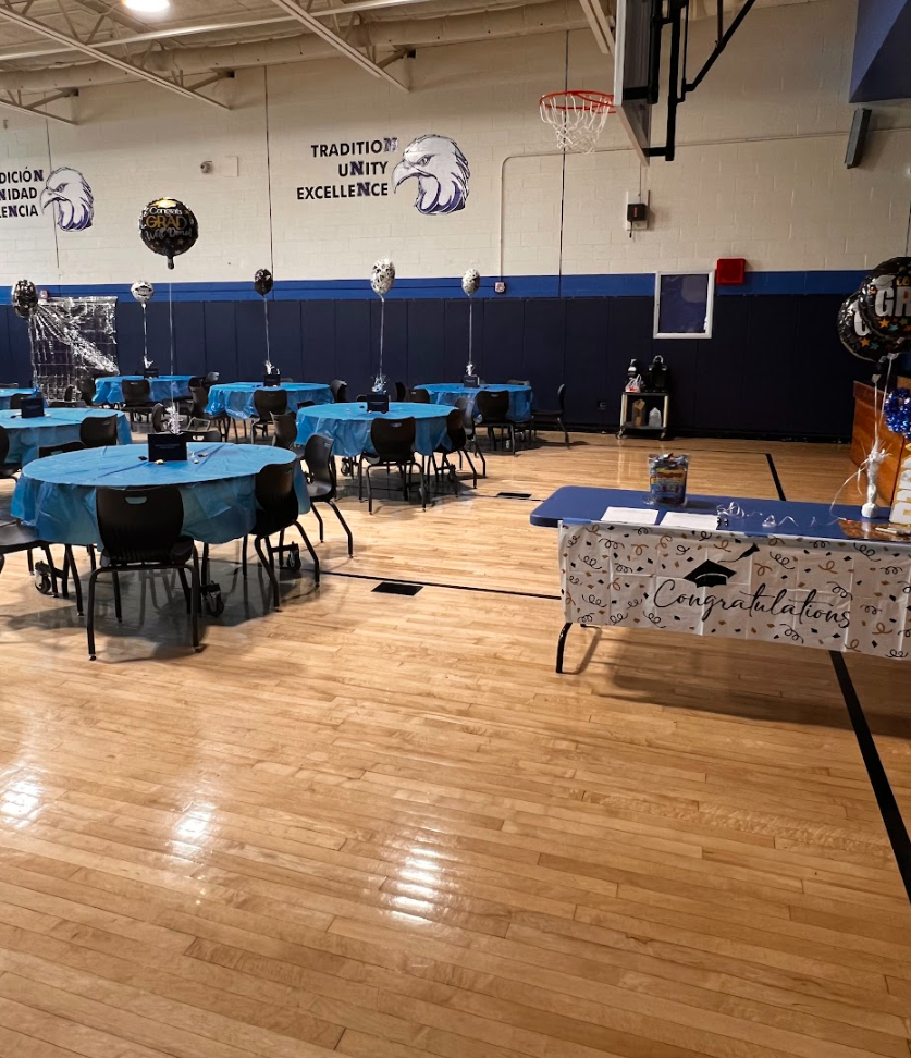 The gym is set up for the senior spaghetti dinner