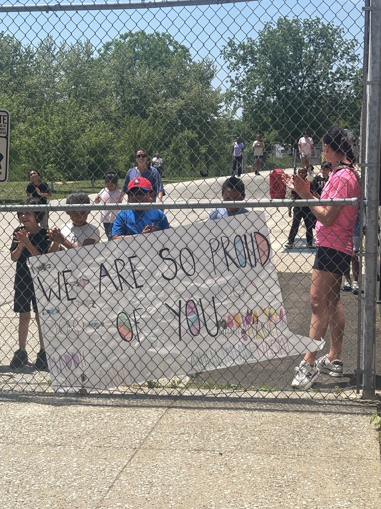 Students cheering on the students attending Special Olympics.