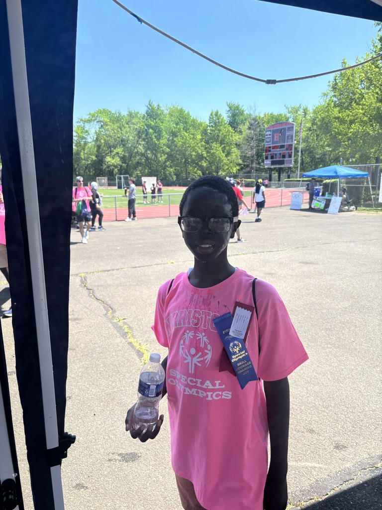 A student showing their ribbons. 