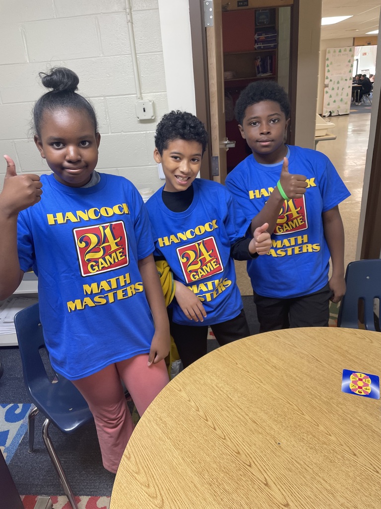 Three students at the Math 24 competition. 